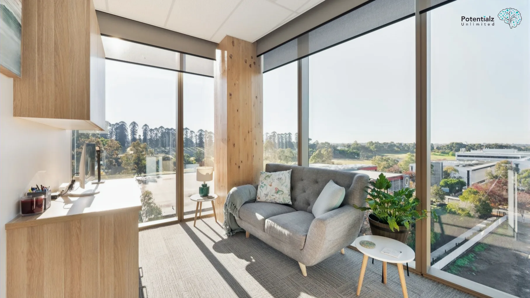 Bright and serene therapy room at Potentialz, designed for comfort and tranquility, offering expansive views to enhance a calming atmosphere.